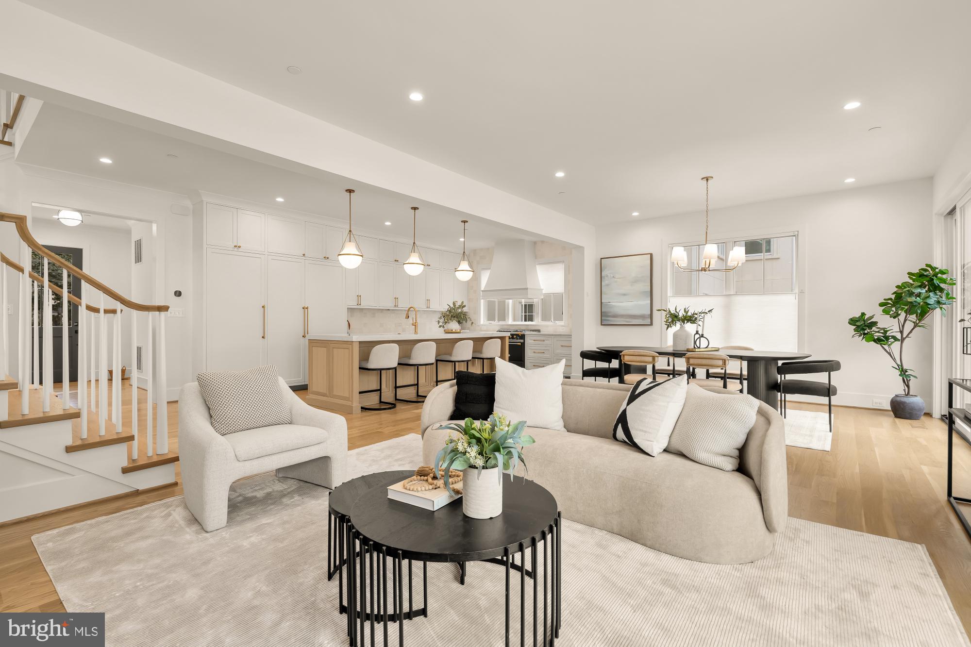 4427 Ridge Street Chevy Chase, MD 20815 - Photo 10 of 42 a living room with furniture kitchen and a table