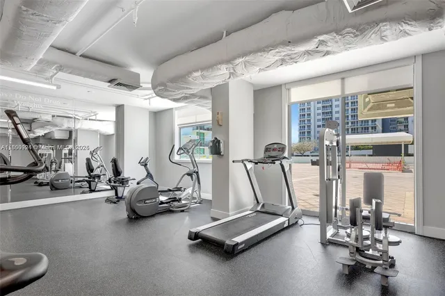 a view of a room with gym equipment