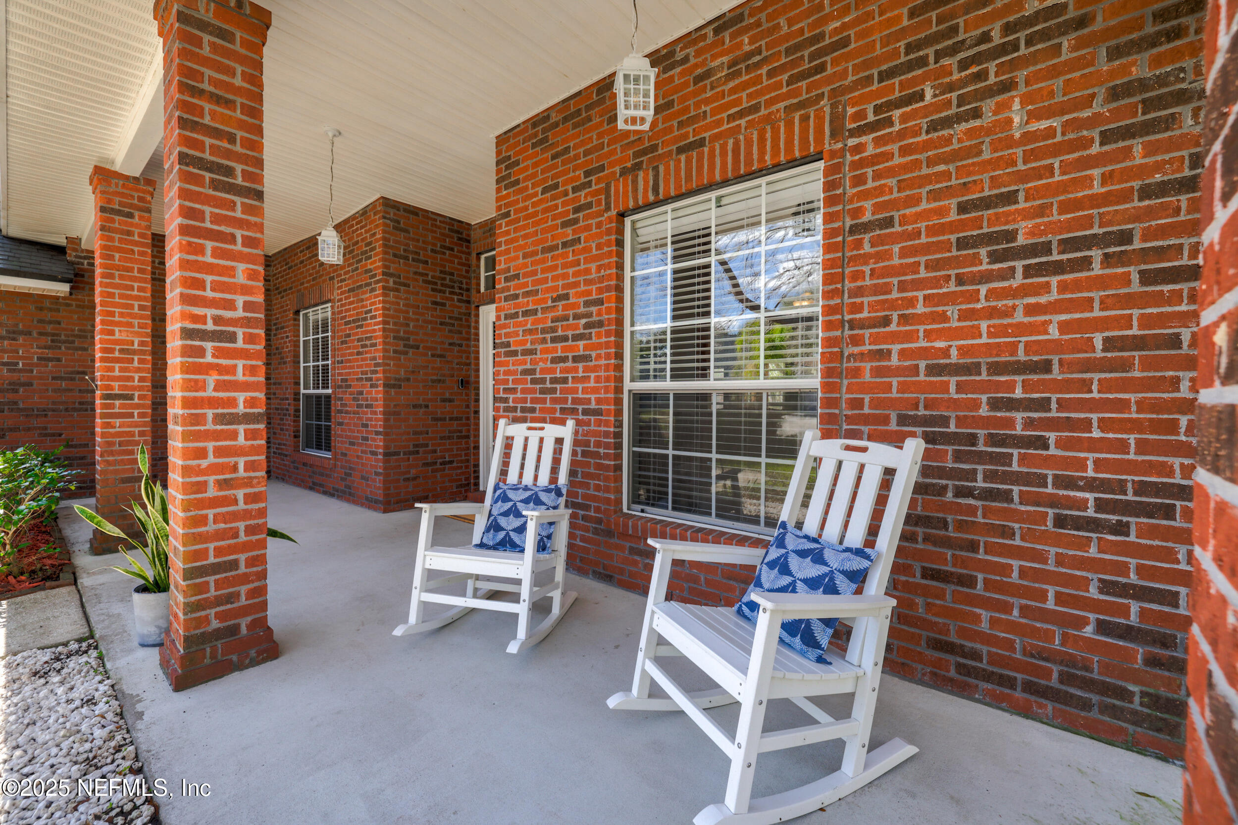 2948 Captiva Bluff Road South Jacksonville, FL 32226 - Photo 40 of 46 a wooden bench sitting in front of a building