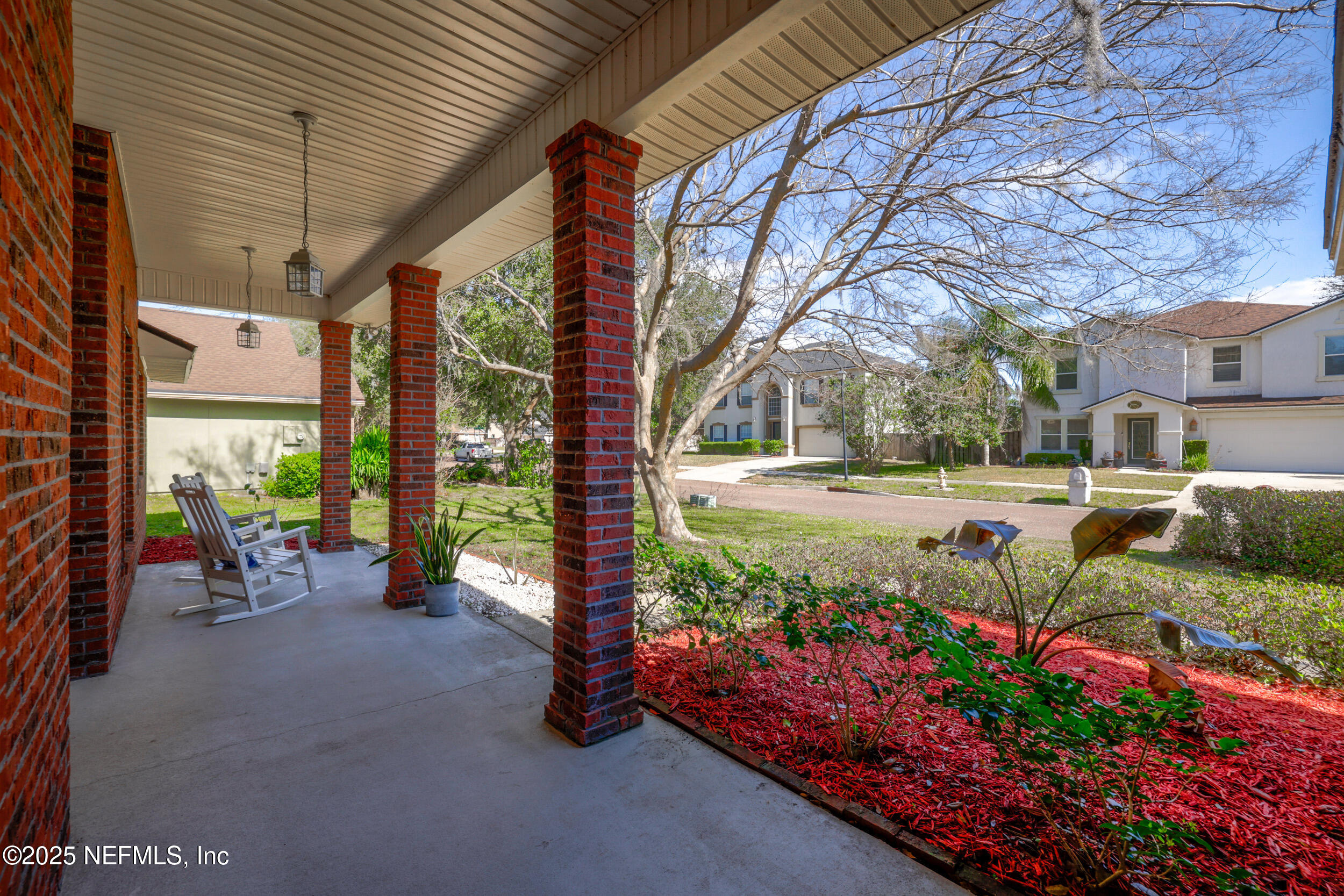 2948 Captiva Bluff Road South Jacksonville, FL 32226 - Photo 41 of 46 a view of a garden with an outdoor seating