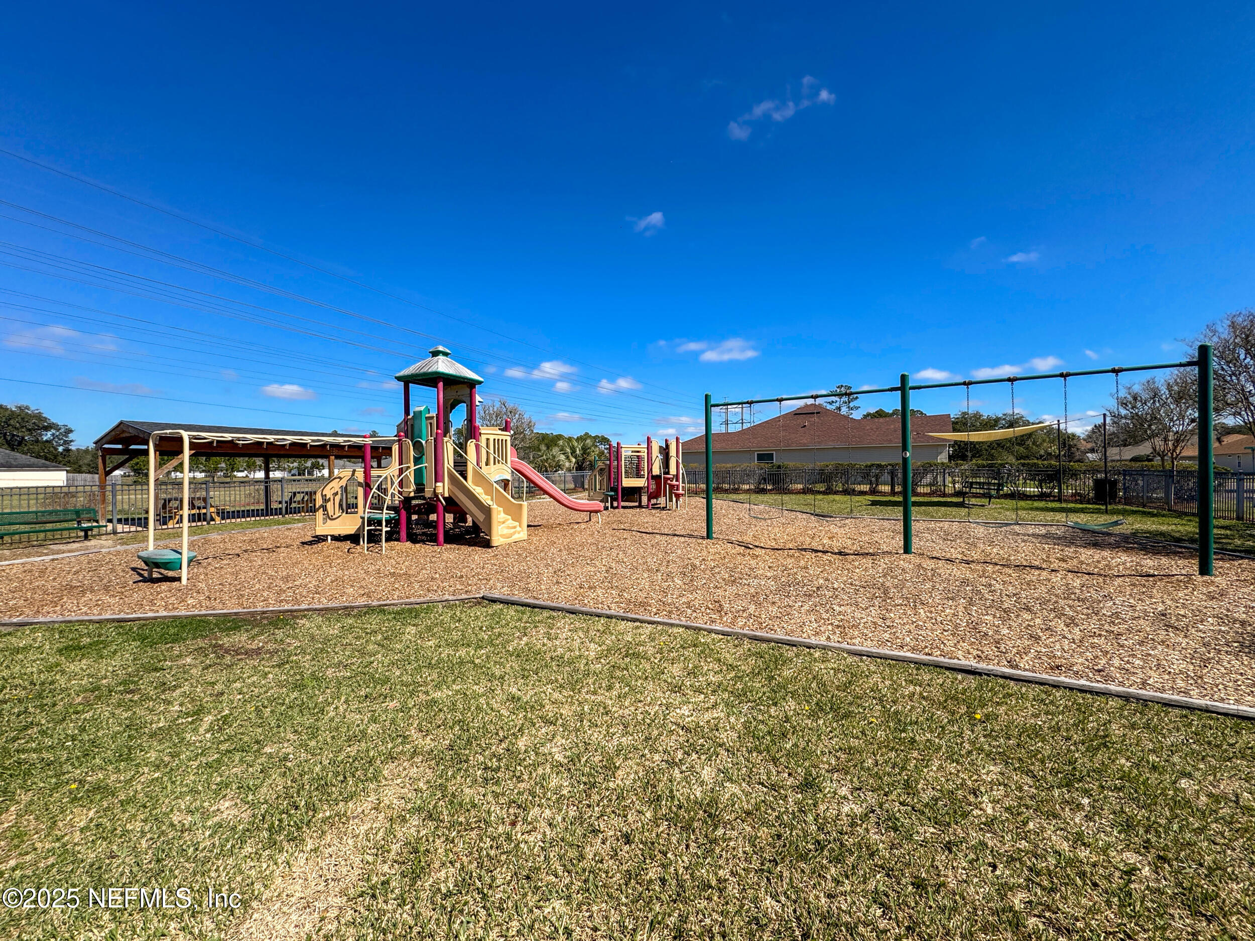2948 Captiva Bluff Road South Jacksonville, FL 32226 - Photo 46 of 46 a view of a yard with a slide