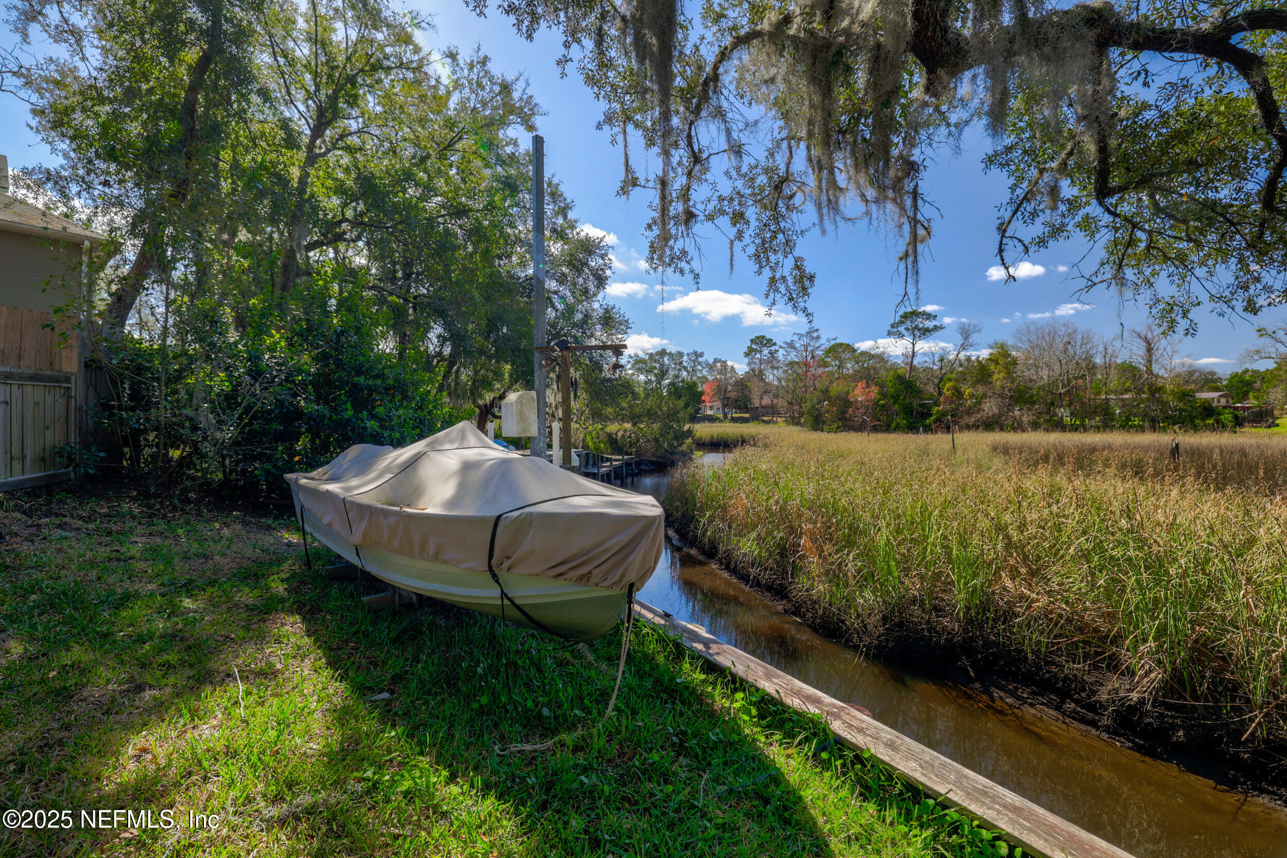 2948 Captiva Bluff Road South Jacksonville, FL 32226 - Photo 8 of 46 a garden view with a seating space