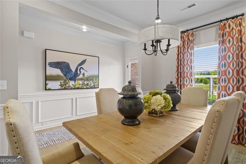 156 Saddle Ridge Trail Calhoun, GA 30701 - Photo 19 of 45 a view of a dining room with furniture window and outside view