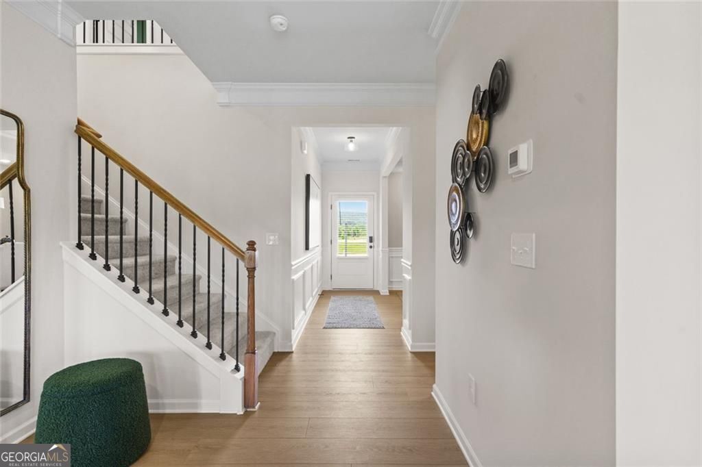 156 Saddle Ridge Trail Calhoun, GA 30701 - Photo 3 of 45 a view of an entryway with wooden floor