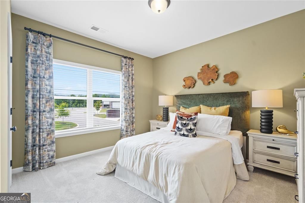 156 Saddle Ridge Trail Calhoun, GA 30701 - Photo 36 of 45 a bedroom with a bed and a window