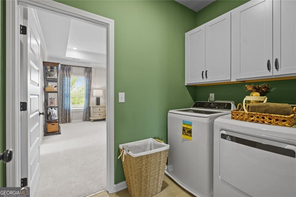 156 Saddle Ridge Trail Calhoun, GA 30701 - Photo 40 of 45 a utility room with dryer and washer