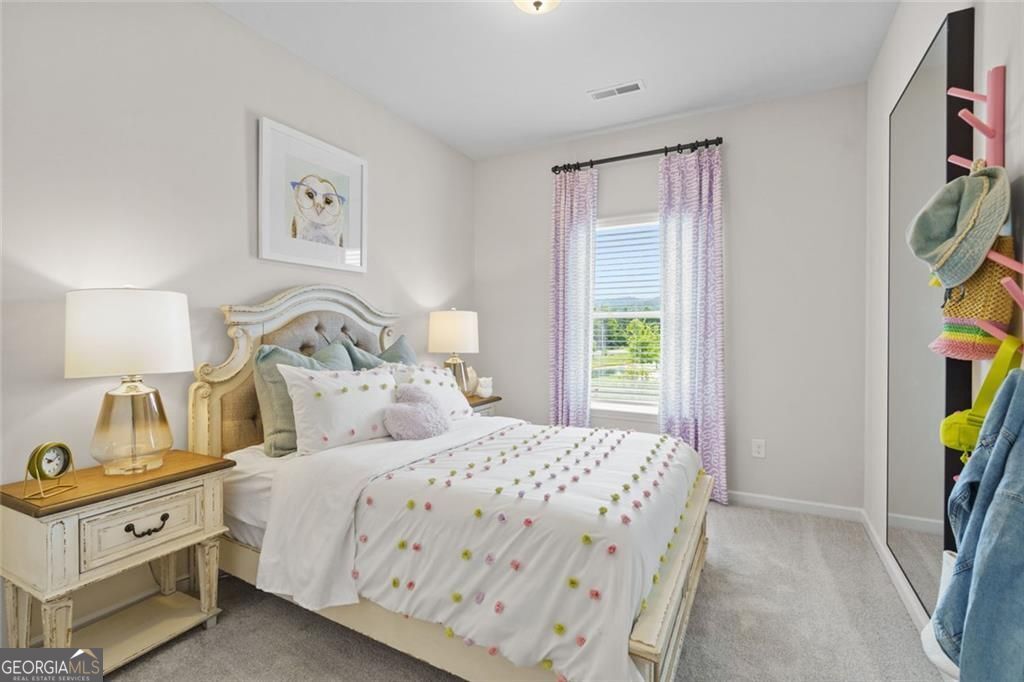 156 Saddle Ridge Trail Calhoun, GA 30701 - Photo 42 of 45 a bedroom with a bed and a window