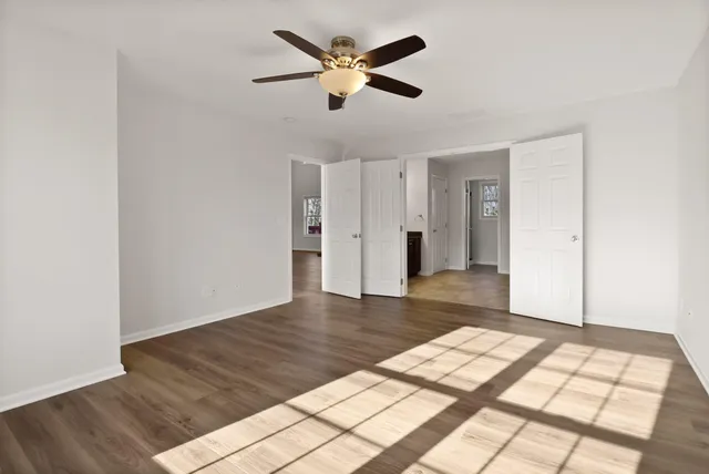 a view of a kitchen with a sink and a stove top oven