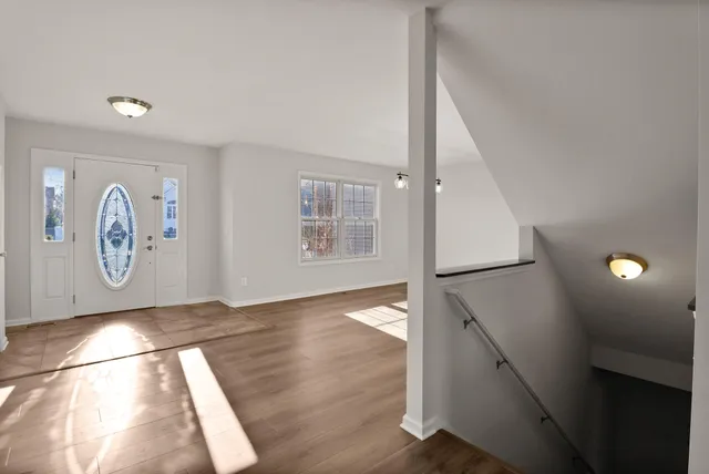 a view of a hallway with entryway