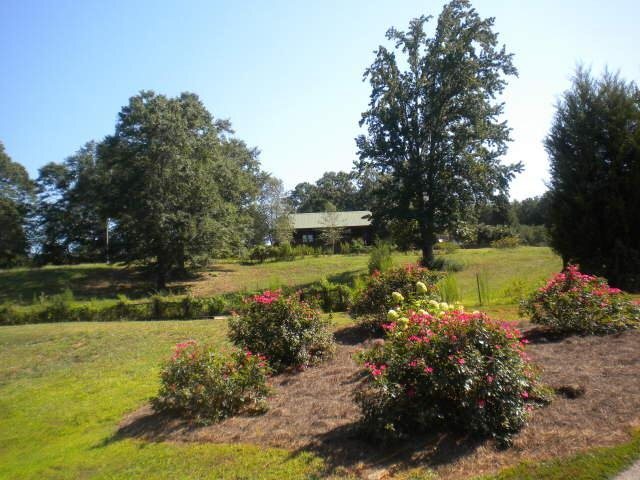 205 Jackson Shoals Road Franklin, GA 30217 - Photo 1 of 1 a view of a lake with a park