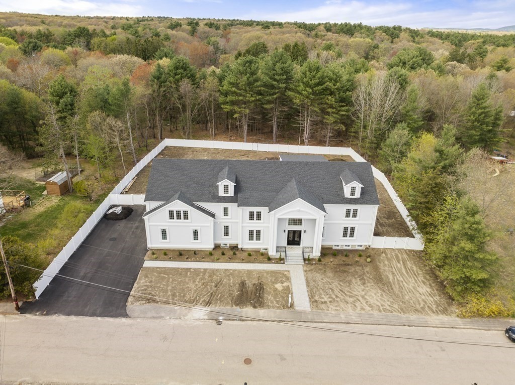 15 Marcus Road Sharon, MA 02067 - Photo 19 of 21 an aerial view of a house with a yard