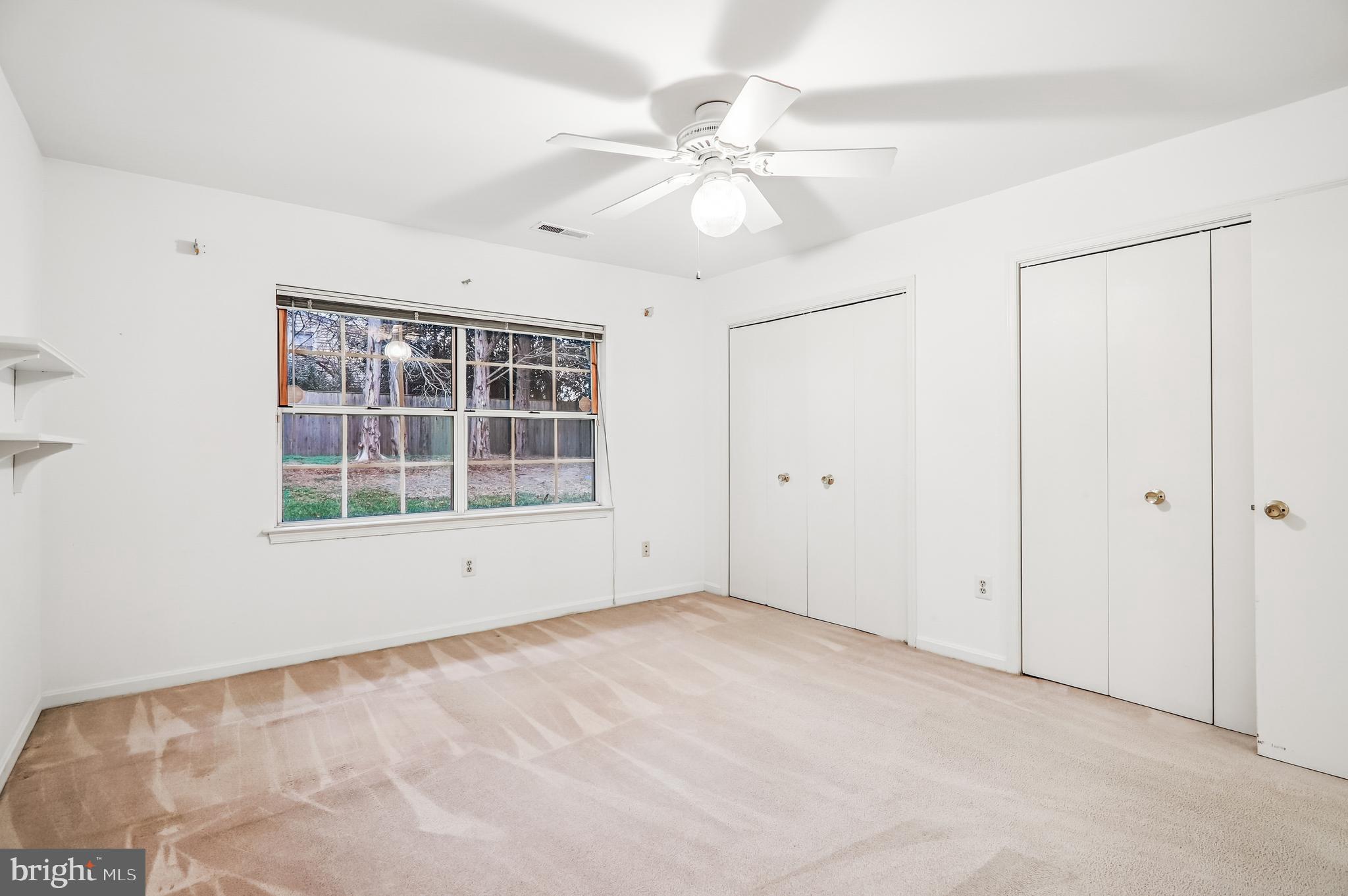 9272 Cherry Lane, Unit 75 Laurel, MD 20708 - Photo 22 of 37 a view of an empty room with a window
