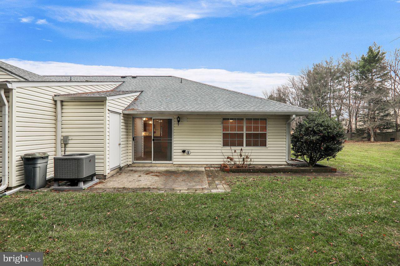 9272 Cherry Lane, Unit 75 Laurel, MD 20708 - Photo 33 of 37 a house view with a garden space