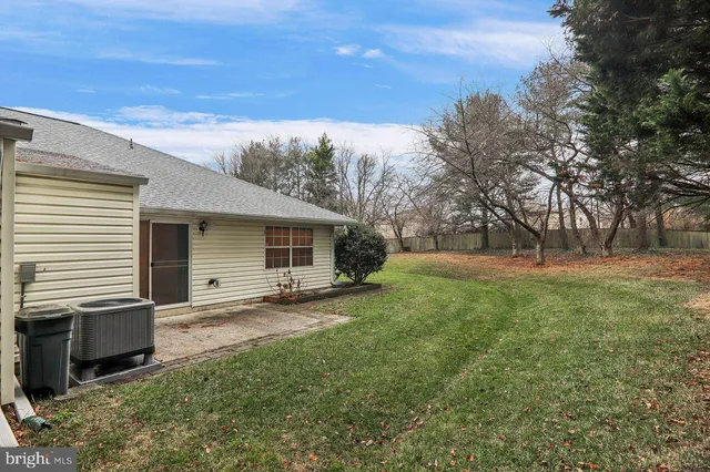 a house with garden in front of it