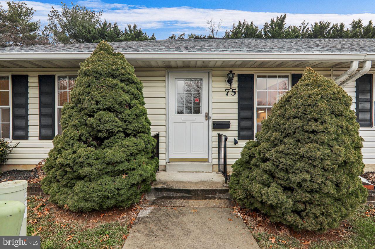 9272 Cherry Lane, Unit 75 Laurel, MD 20708 - Photo 4 of 37 a front view of a house