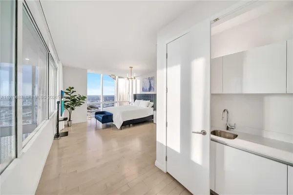 a view of utility room and living room