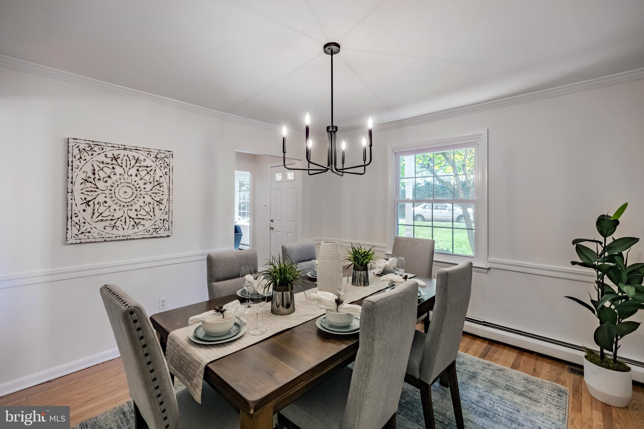 30 Llandillo Road Havertown, PA 19083 - Photo 12 of 47 a view of a dining room with furniture window and wooden floor