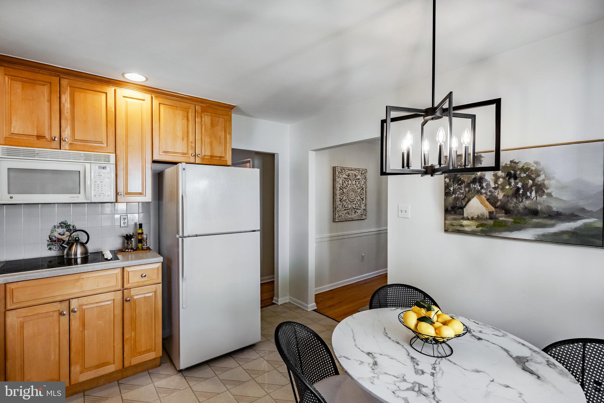 30 Llandillo Road Havertown, PA 19083 - Photo 16 of 47 a kitchen with stainless steel appliances a refrigerator a sink a stove and a refrigerator