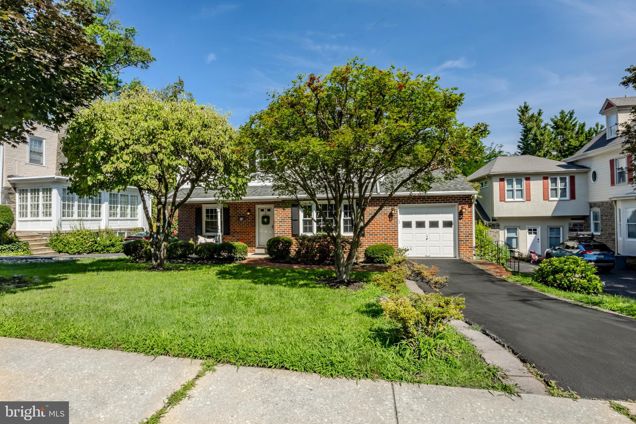 30 Llandillo Road Havertown, PA 19083 - Photo 2 of 47 front view of a house with a yard