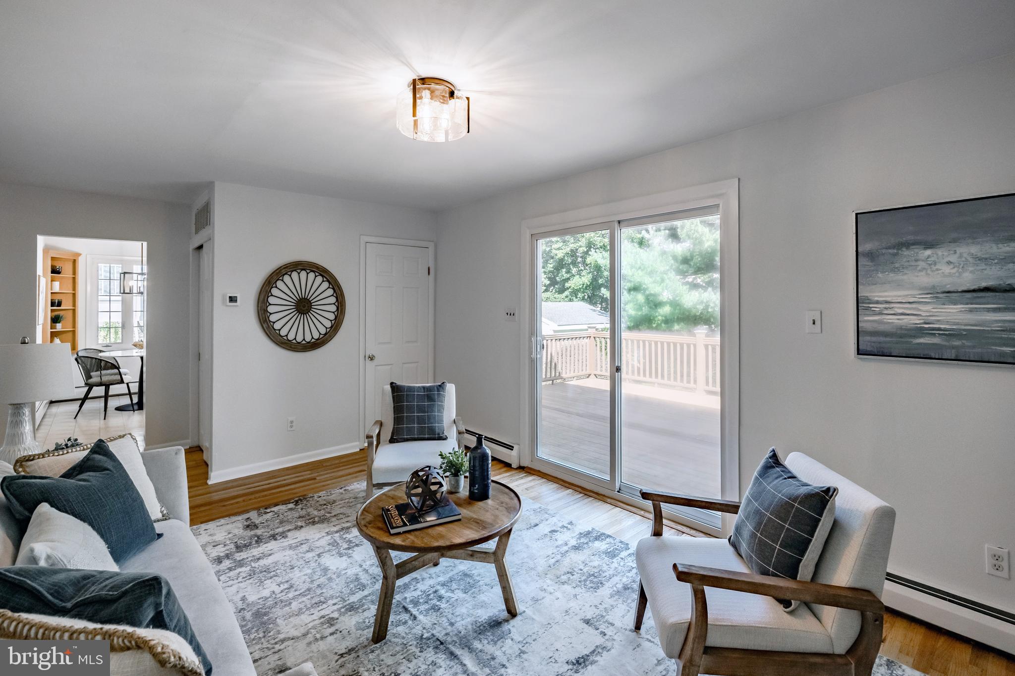30 Llandillo Road Havertown, PA 19083 - Photo 23 of 47 a living room with furniture a rug and a window