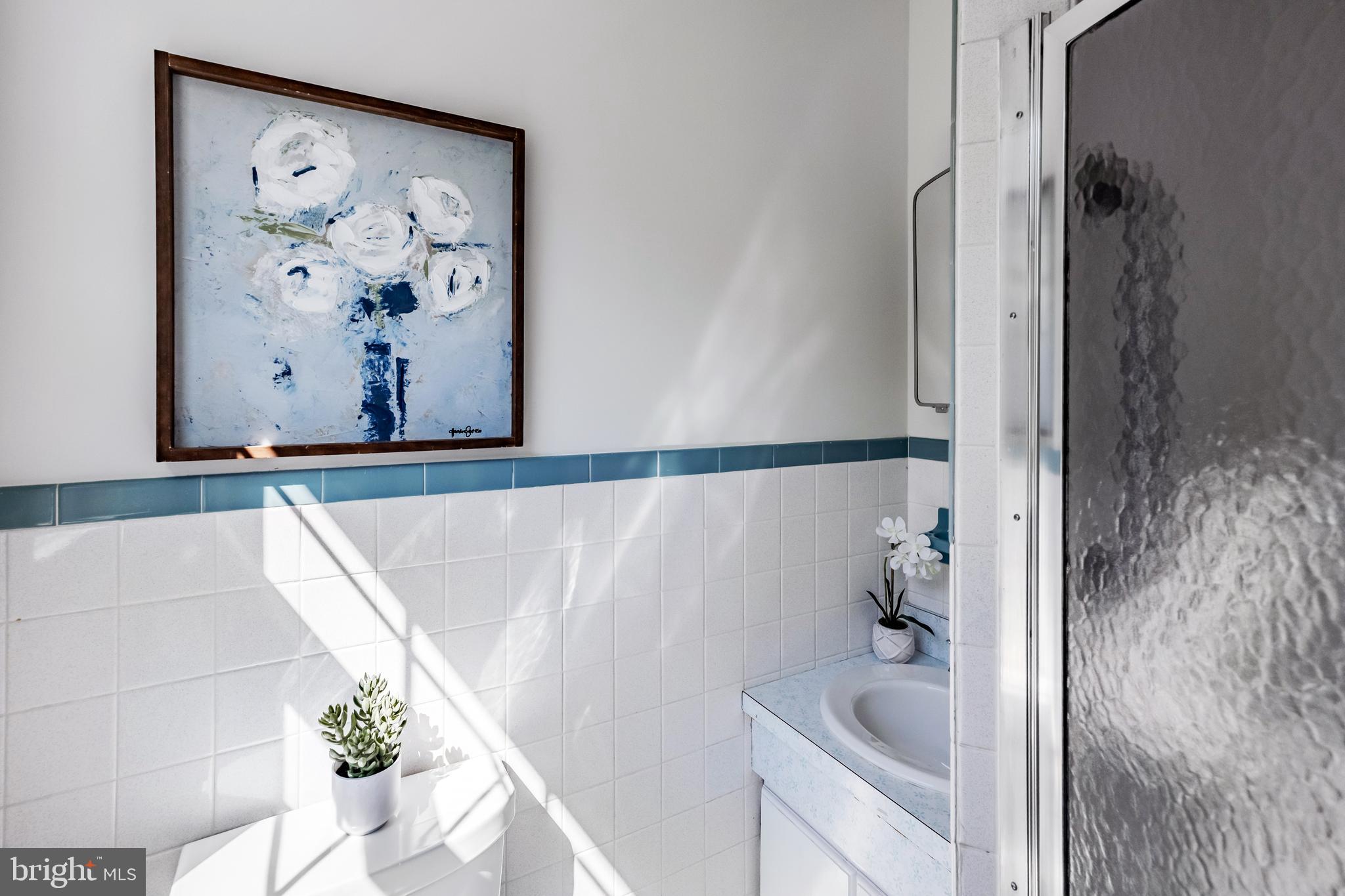 30 Llandillo Road Havertown, PA 19083 - Photo 32 of 47 a bathroom with a bathtub and shower