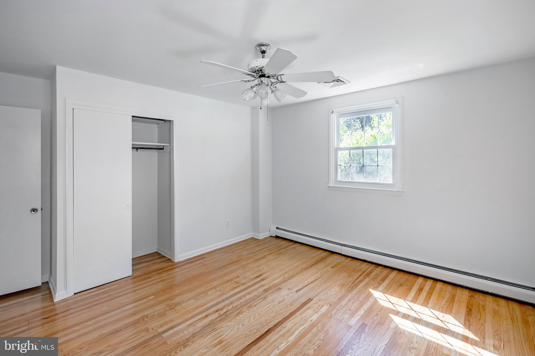 30 Llandillo Road Havertown, PA 19083 - Photo 33 of 47 wooden floor in an empty room with a window