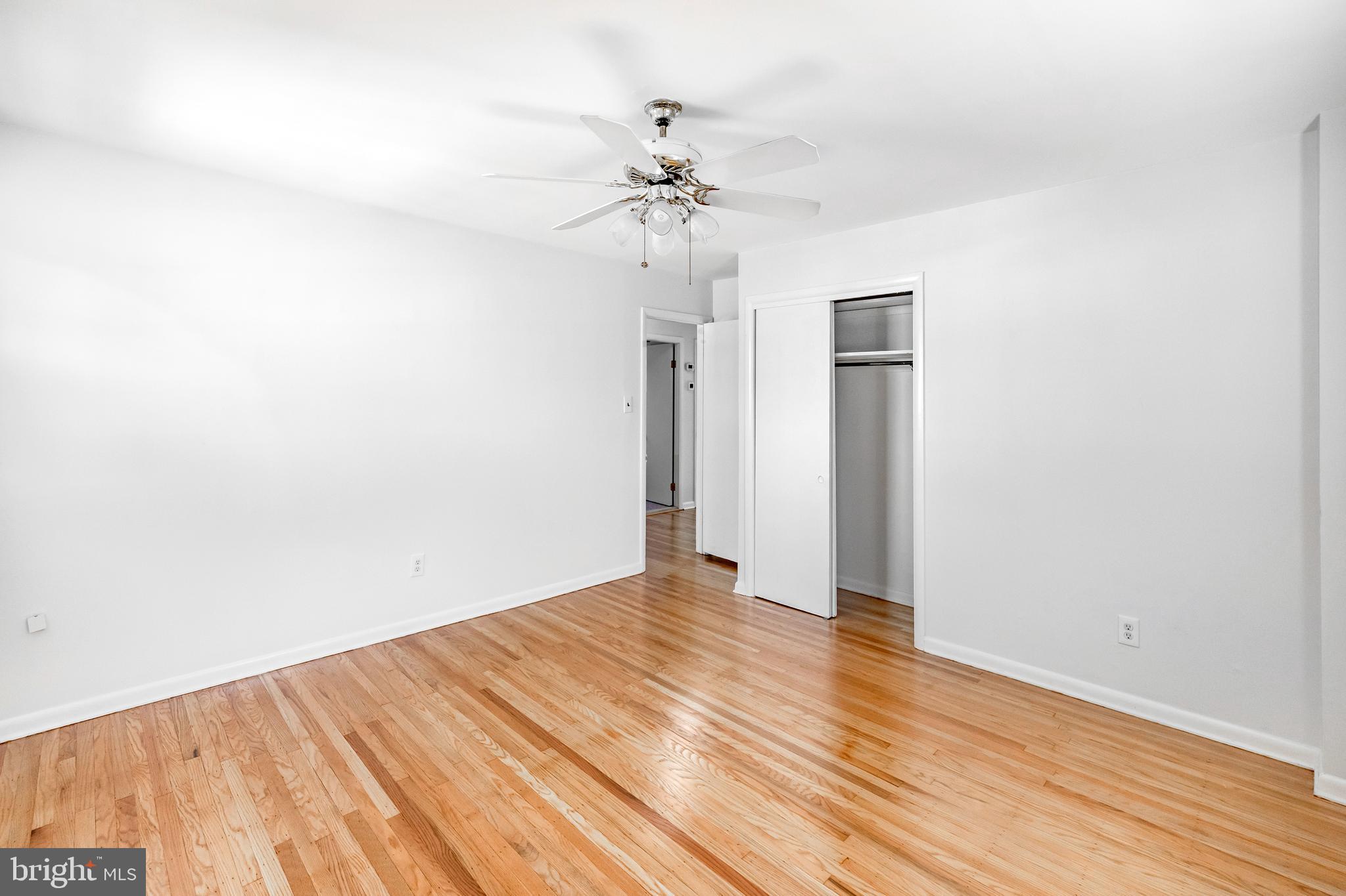 30 Llandillo Road Havertown, PA 19083 - Photo 34 of 47 a view of a room with wooden floor and ceiling fan