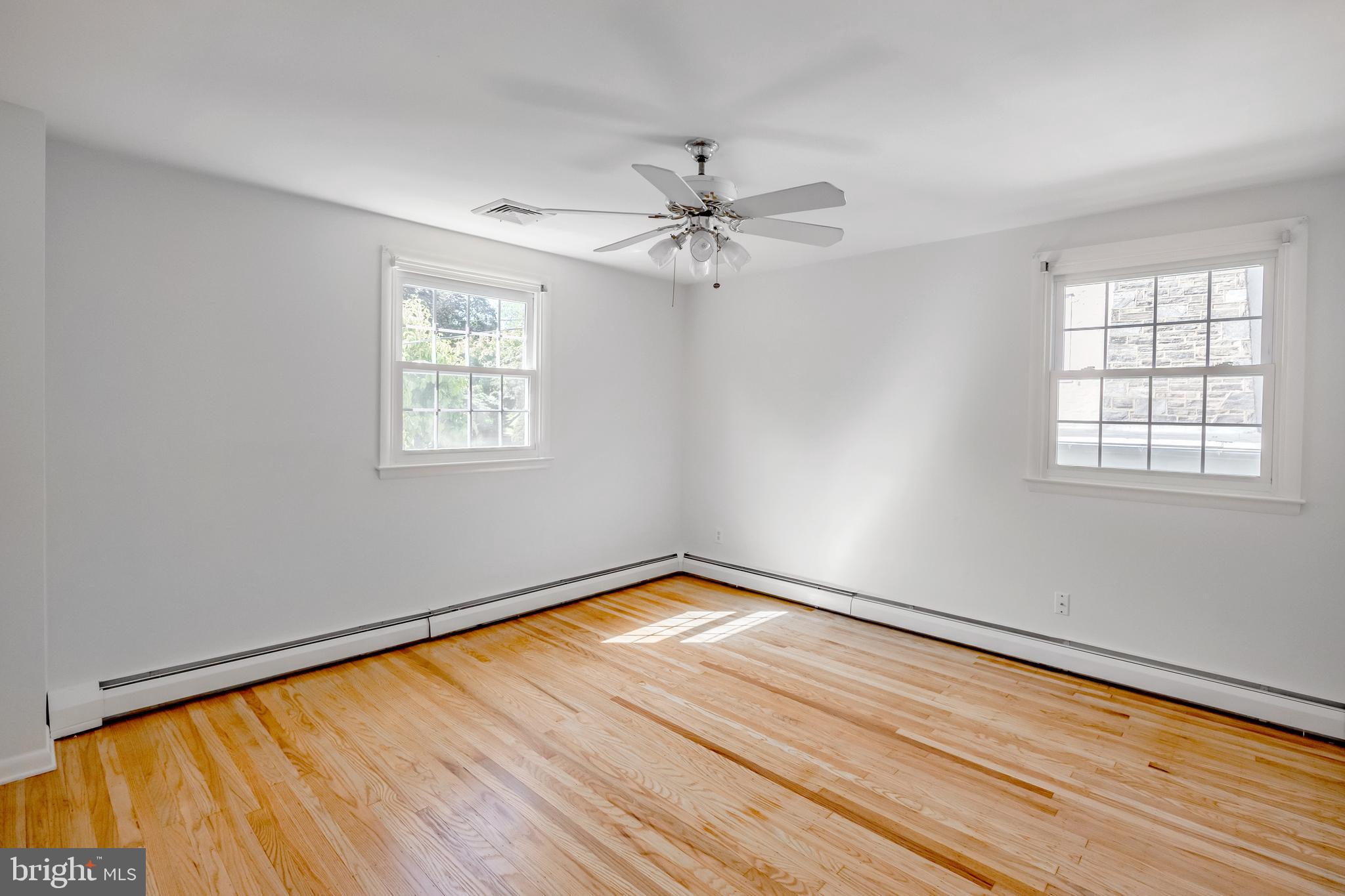 30 Llandillo Road Havertown, PA 19083 - Photo 35 of 47 an empty room with windows and fan