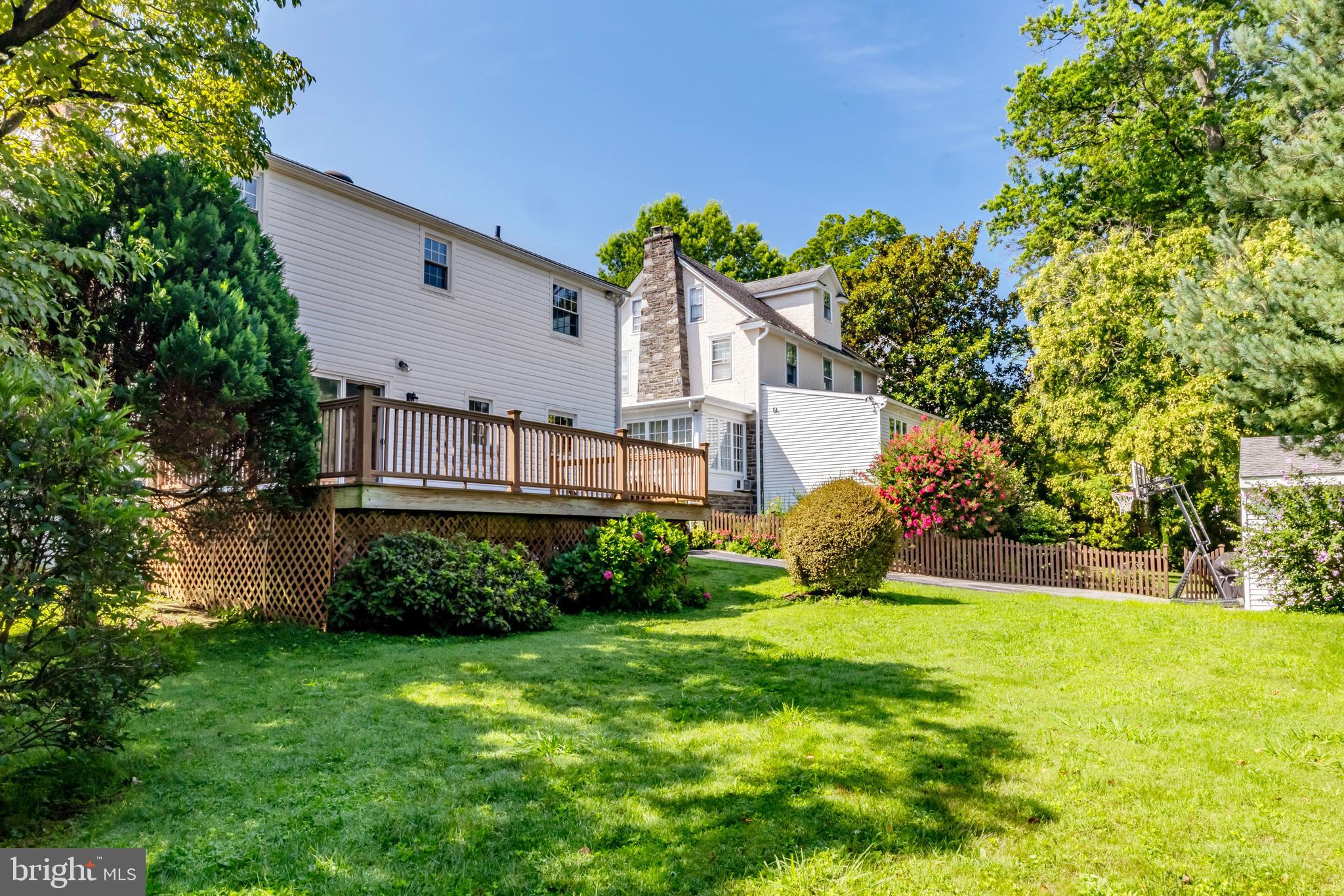 30 Llandillo Road Havertown, PA 19083 - Photo 46 of 47 a view of a house with a yard and potted plants