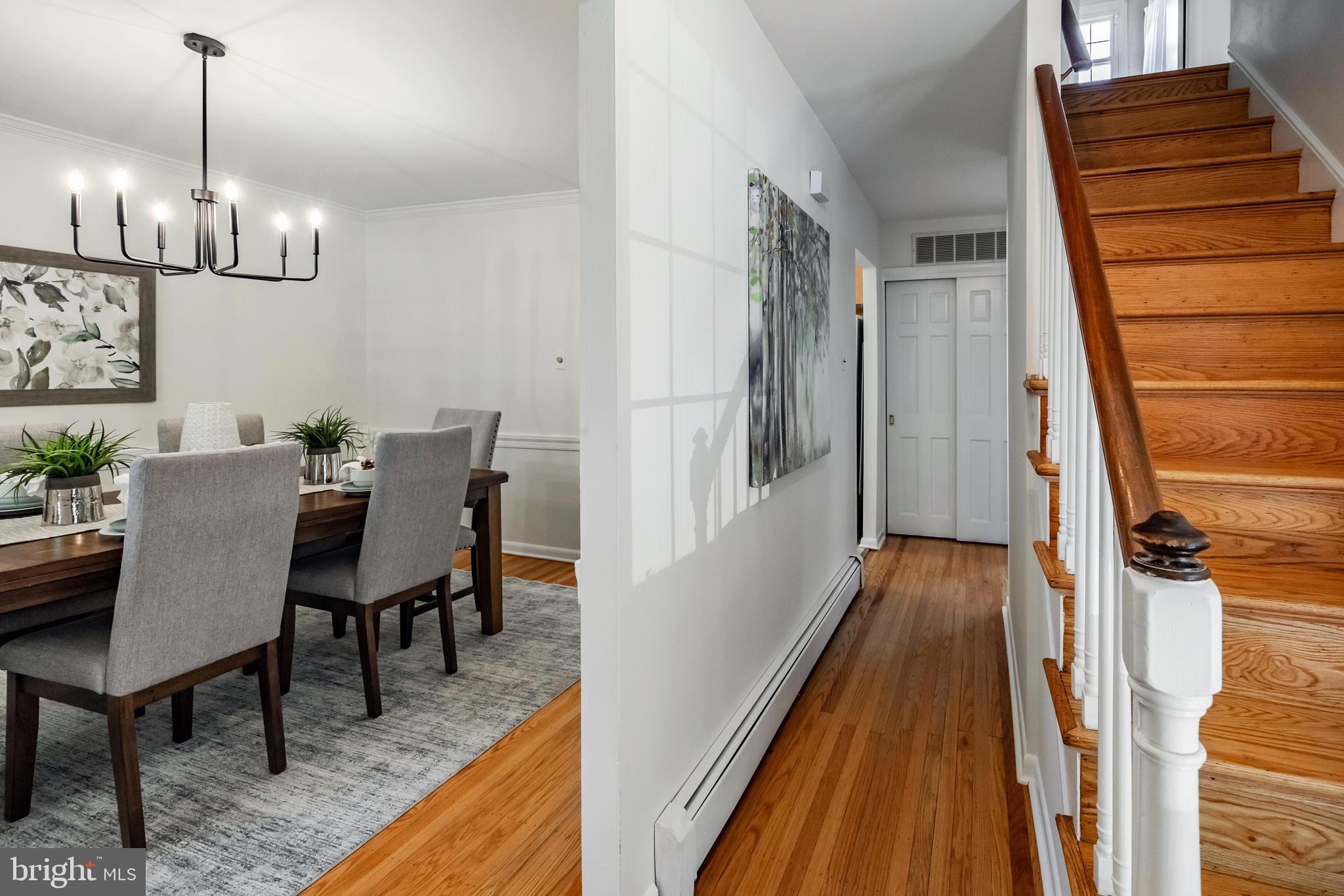 30 Llandillo Road Havertown, PA 19083 - Photo 6 of 47 a view of a dining room with furniture wooden floor and chandelier