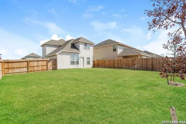 a view of a front of house with a yard