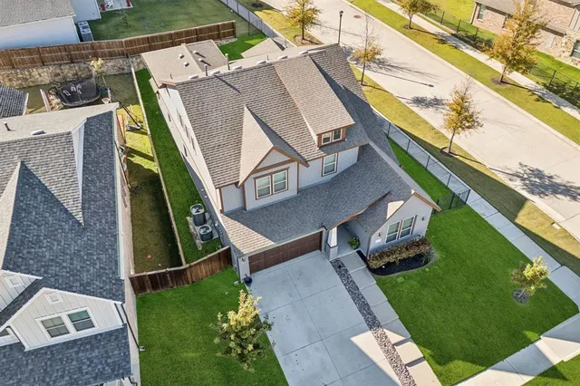 a aerial view of a house with a garden and plants