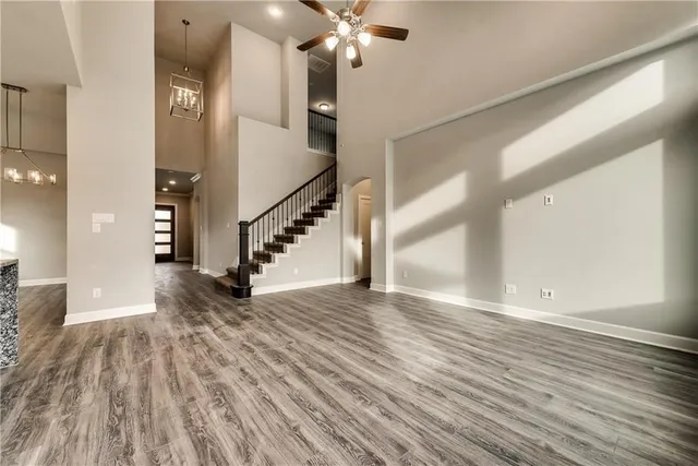 a view of an entryway with wooden floor