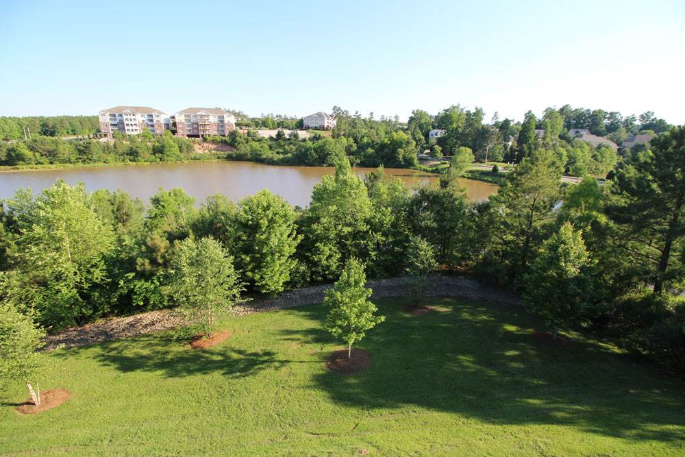 251 Broadgait Brae Road Cary, NC 27519 - Photo 3 of 25 Enjoy breath-taking lake views from master bedroom! Master Bedroom View