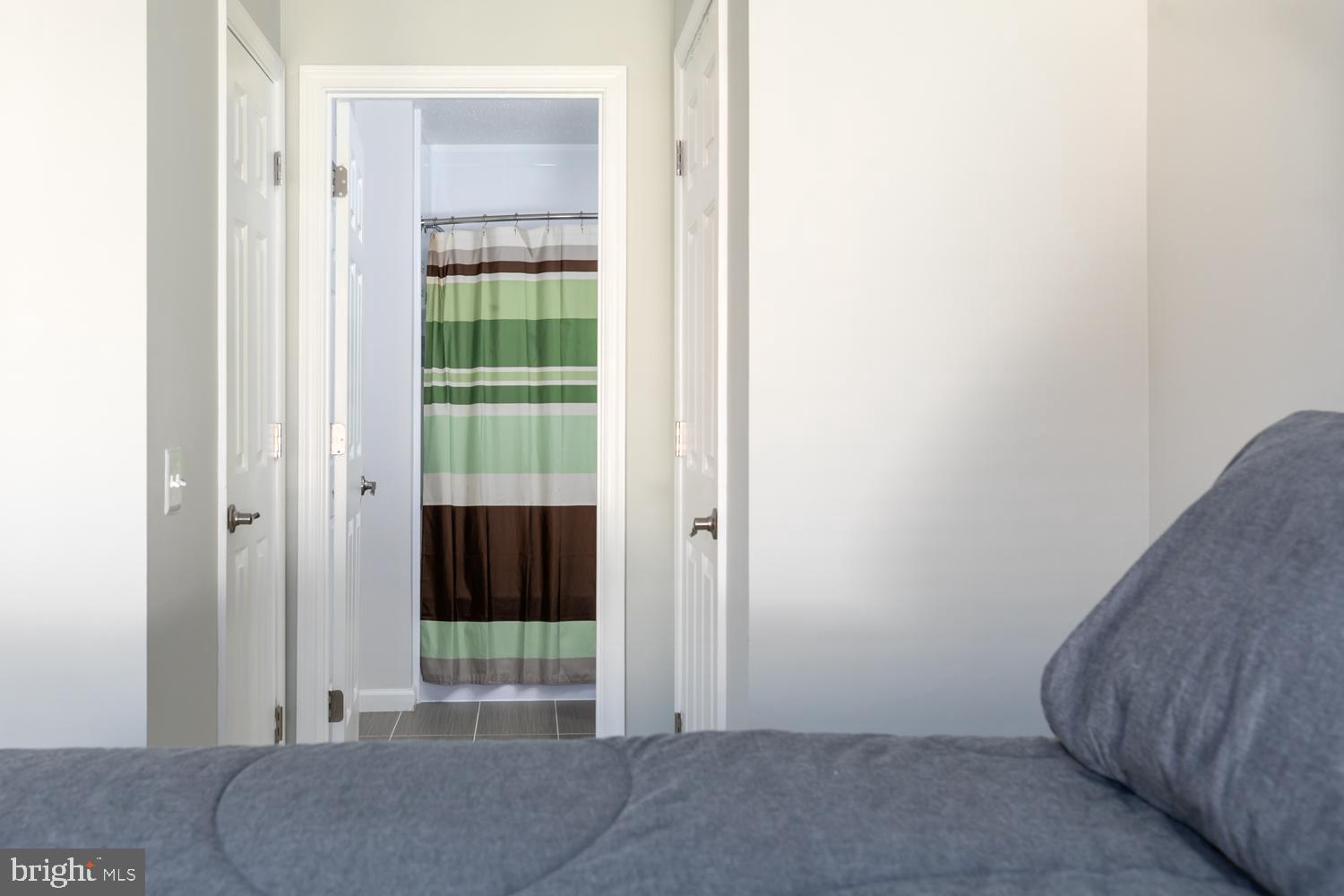 131 Fort Evans Road Southeast, Unit D Leesburg, VA 20175 - Photo 11 of 17 Ensuite bath, walk in closet & wardrobe