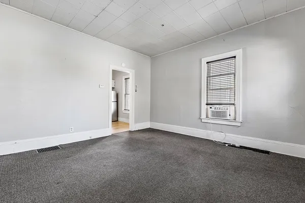 an empty room with windows