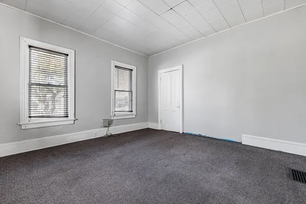 an empty room with windows