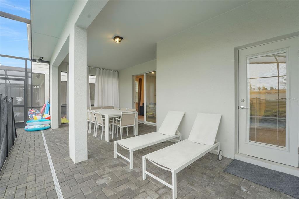 4450 Kaipo Road Davenport, FL 33897 - Photo 21 of 66 a view of a chairs and table in a room