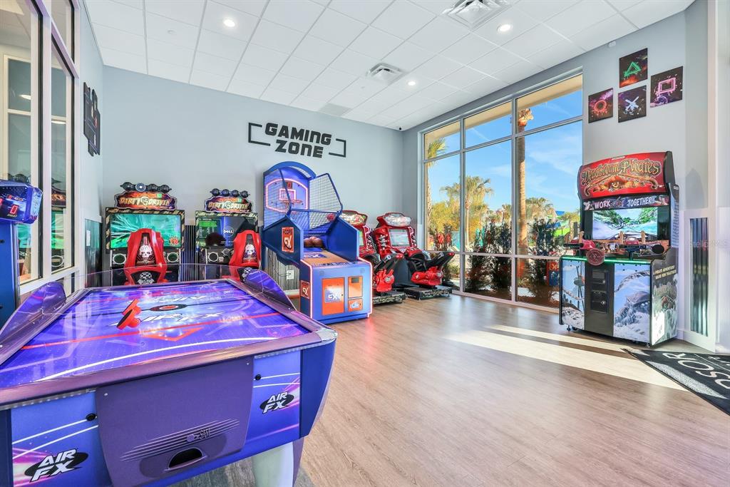 4450 Kaipo Road Davenport, FL 33897 - Photo 61 of 66 a view of a play room with toys and toys