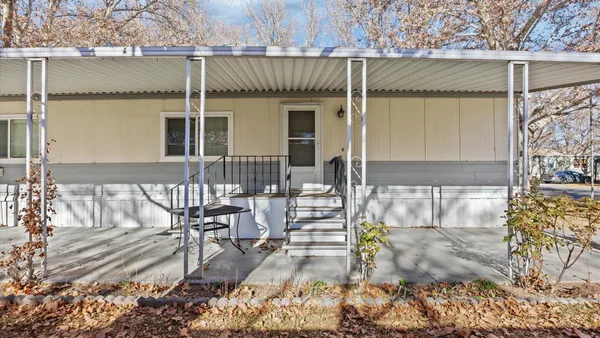 a front view of a house with a porch