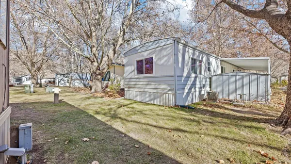 a front view of a house with a patio