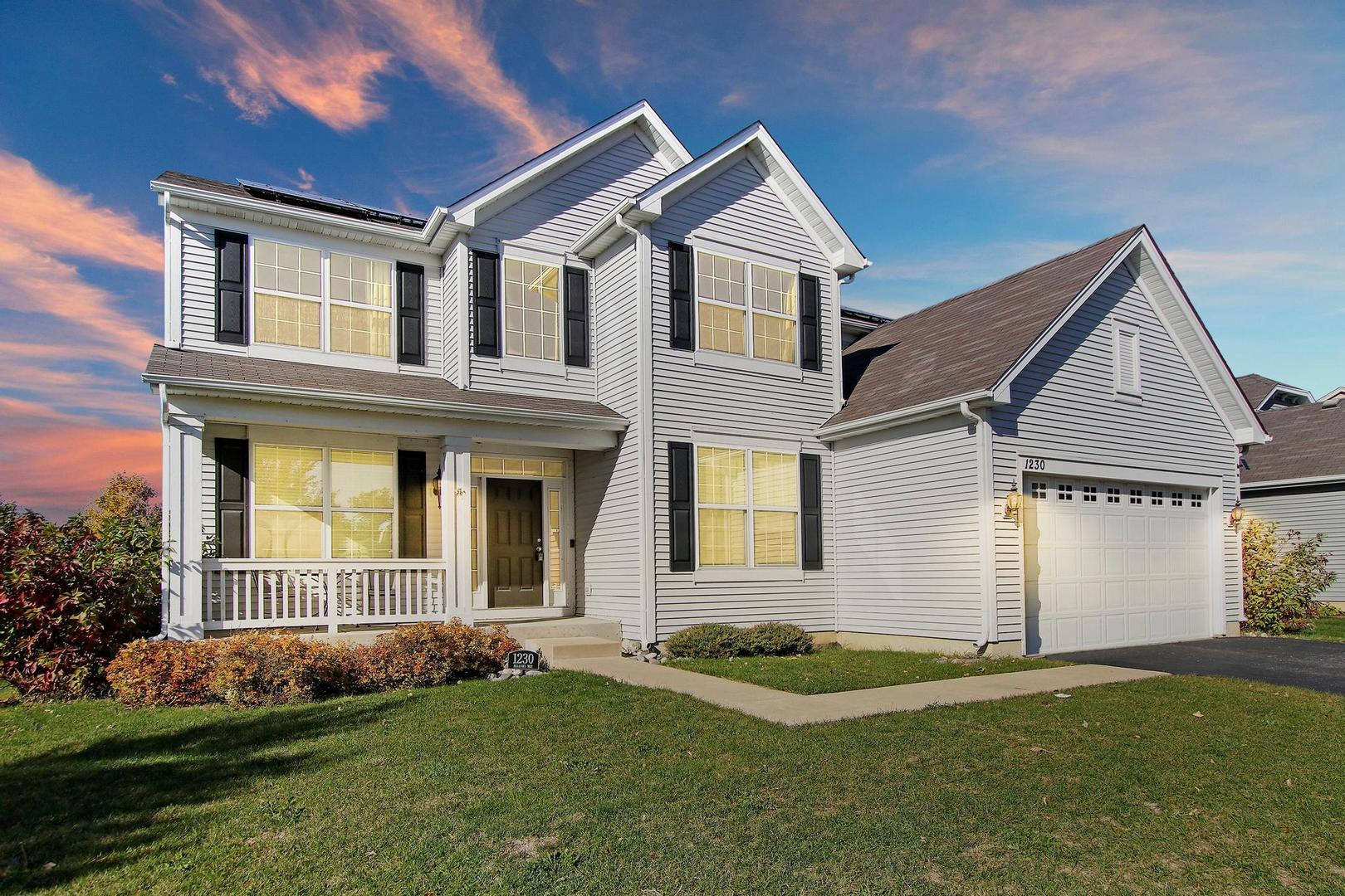 1230 Bellows Way Volo, IL 60073 - Photo 2 of 32 a front view of a house with a yard