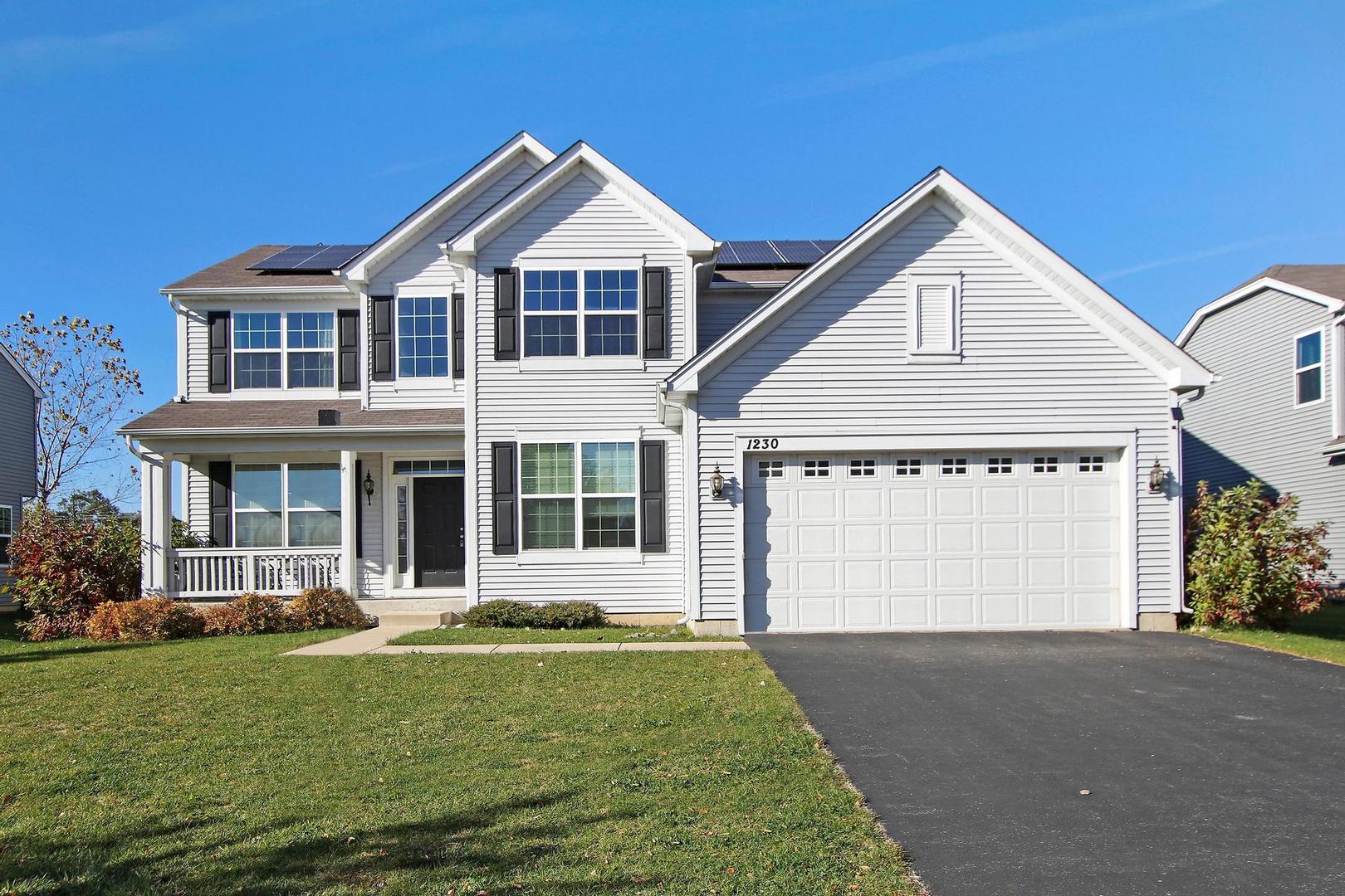 1230 Bellows Way Volo, IL 60073 - Photo 3 of 32 a front view of a house with a yard