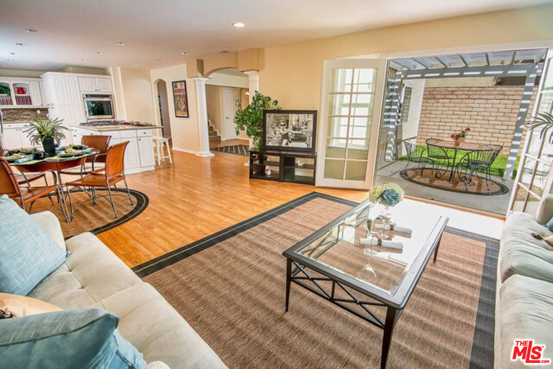 7830 West 83rd Street Playa del Rey, CA 90293 - Photo 17 of 74 a living room with furniture and a floor to ceiling window
