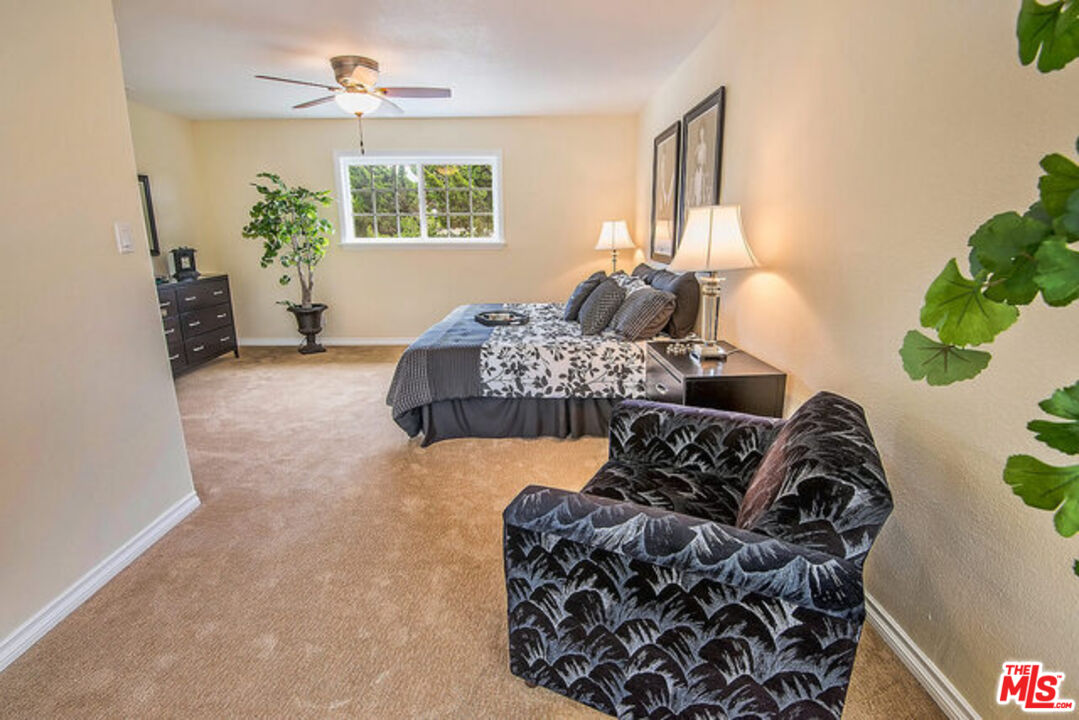 7830 West 83rd Street Playa del Rey, CA 90293 - Photo 33 of 74 a living room with furniture and a window