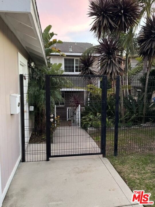 7830 West 83rd Street Playa del Rey, CA 90293 - Photo 4 of 74 a view of a house with backyard porch and sitting area