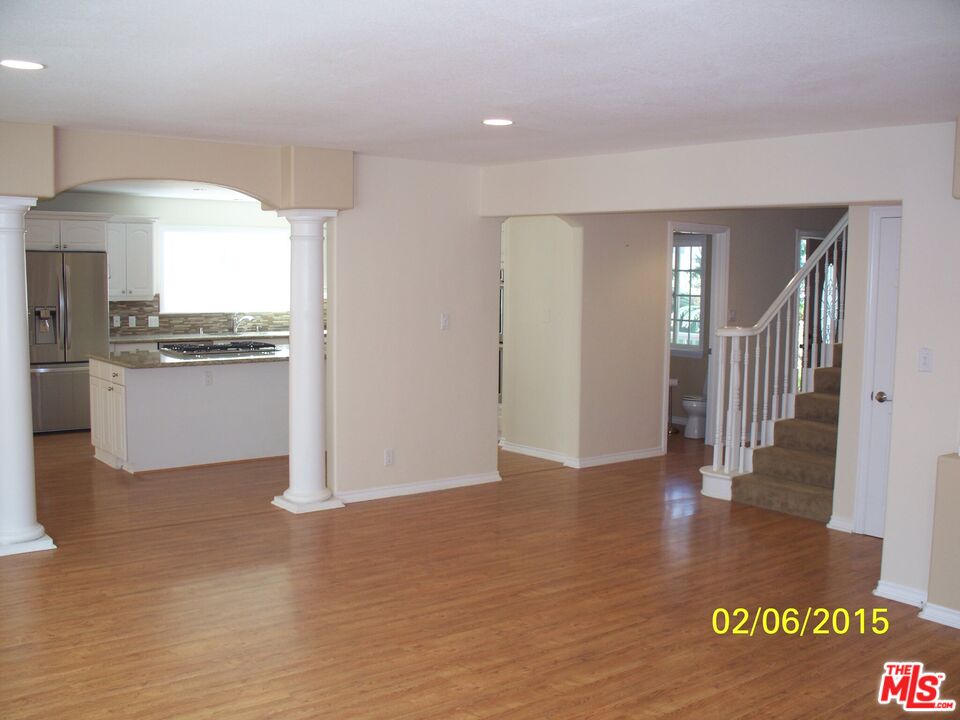7830 West 83rd Street Playa del Rey, CA 90293 - Photo 62 of 74 a view of a kitchen with a sink cabinets and a floor to ceiling window