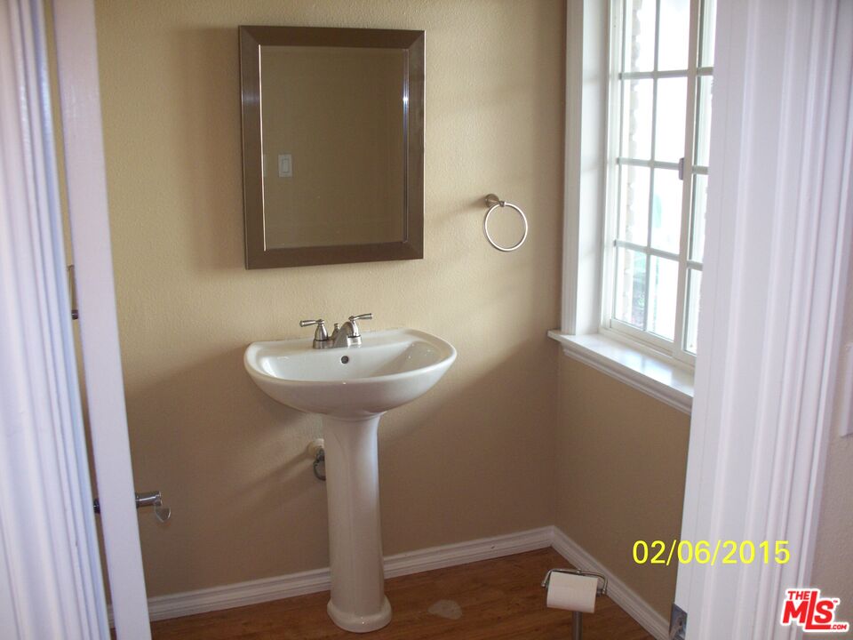 7830 West 83rd Street Playa del Rey, CA 90293 - Photo 70 of 74 a bathroom with a sink and a mirror