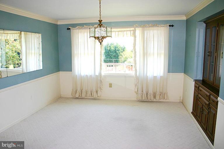 1907 Ridgewood Court Hampstead, MD 21074 - Photo 13 of 25 a view of an empty room with a window