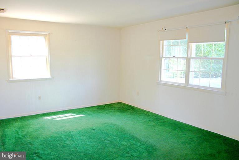 1907 Ridgewood Court Hampstead, MD 21074 - Photo 6 of 25 an empty room with a window